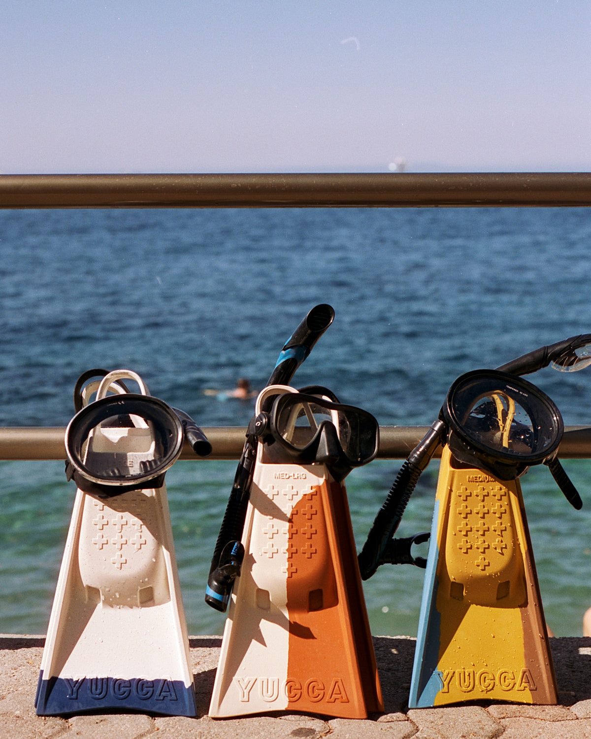 Lifeguard fins on boardwalk