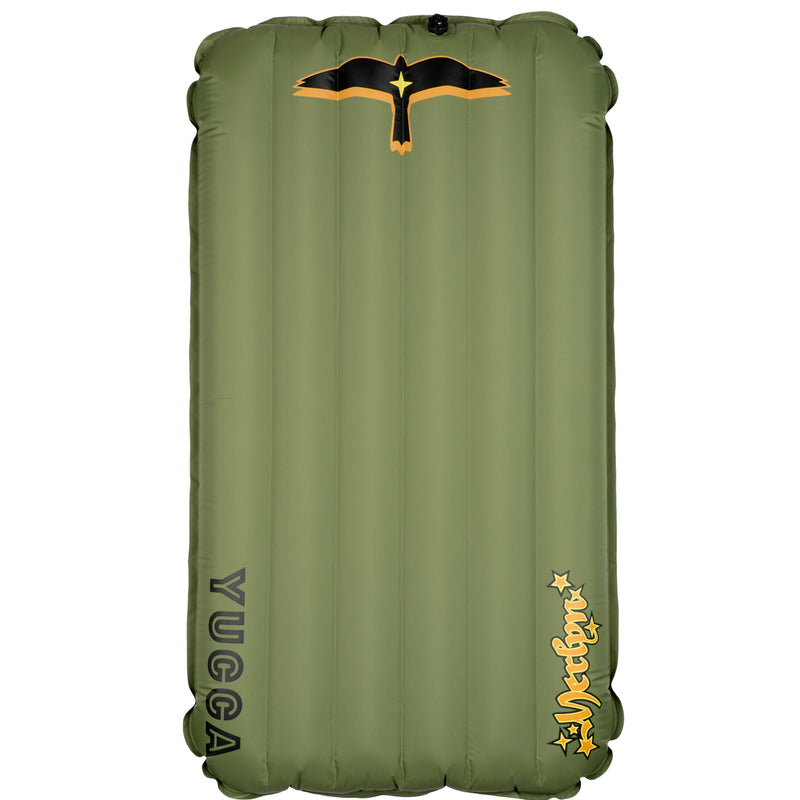 Olive green Yucca Standard Merlyn inflatable surf mat shown flat against a light gray background. Features vertical air chambers, black and gold bird logo at the top, black Yucca logo along the side, and yellow script Merlyn logo near the bottom. 